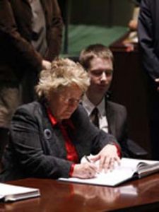 Former Minister for Disabled People Anne McGuire signing the UNCRPD on behalf of the UK Government in 2007